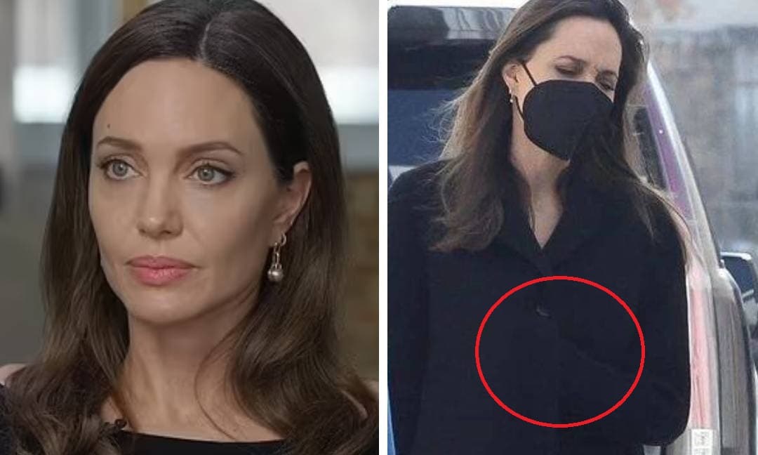 Angelina Jolie xuất hiện với gương mặt cau có nhưng vị trí bàn tay của cô mới là điều đáng chú ý